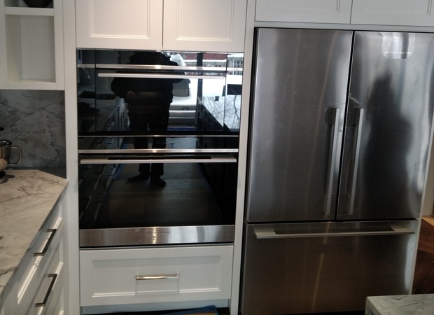 Freestanding fridge installation