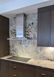 Low profile built-in hood installation on custom backsplash