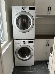 Stacked washer and dryer installation in tight space